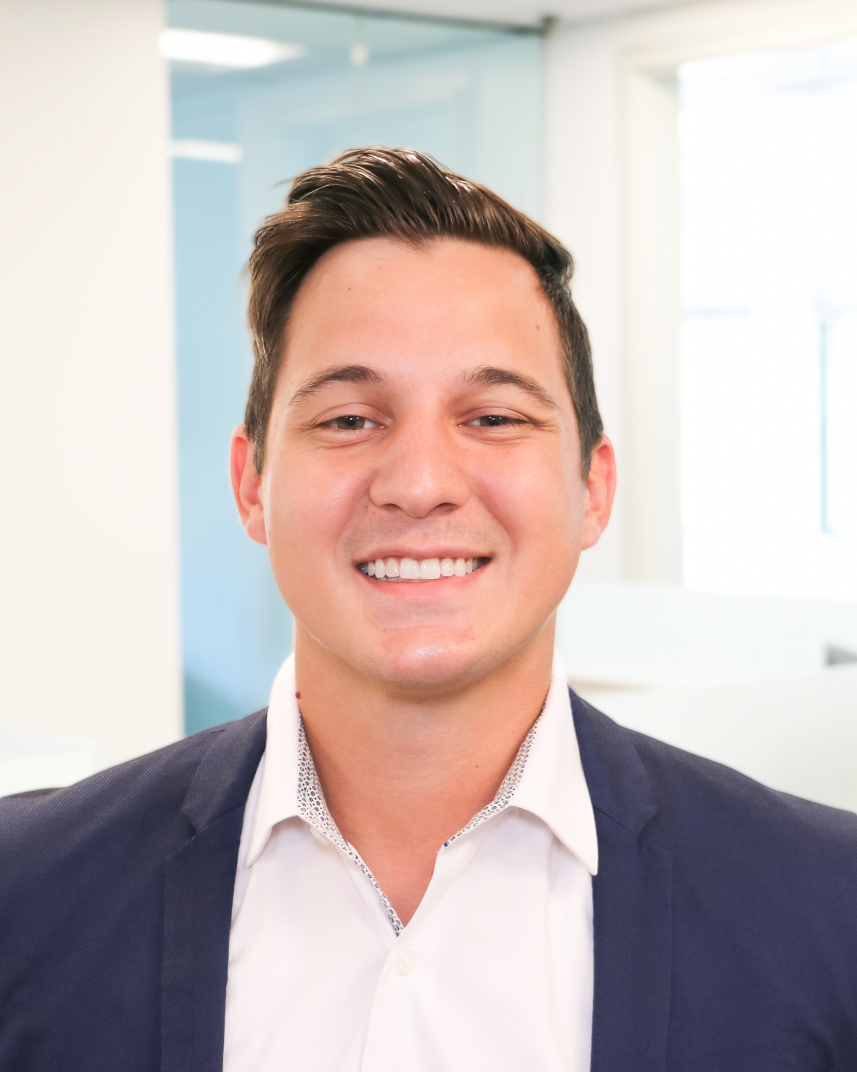 Darius Headshot no Tie Interra Realty